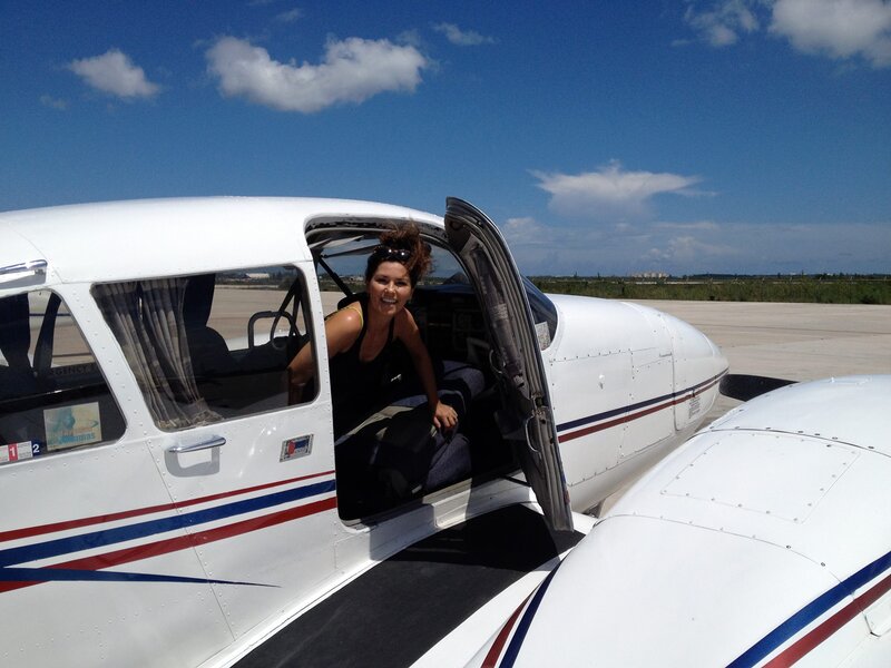 Woman Exiting Airplane — White, Bright