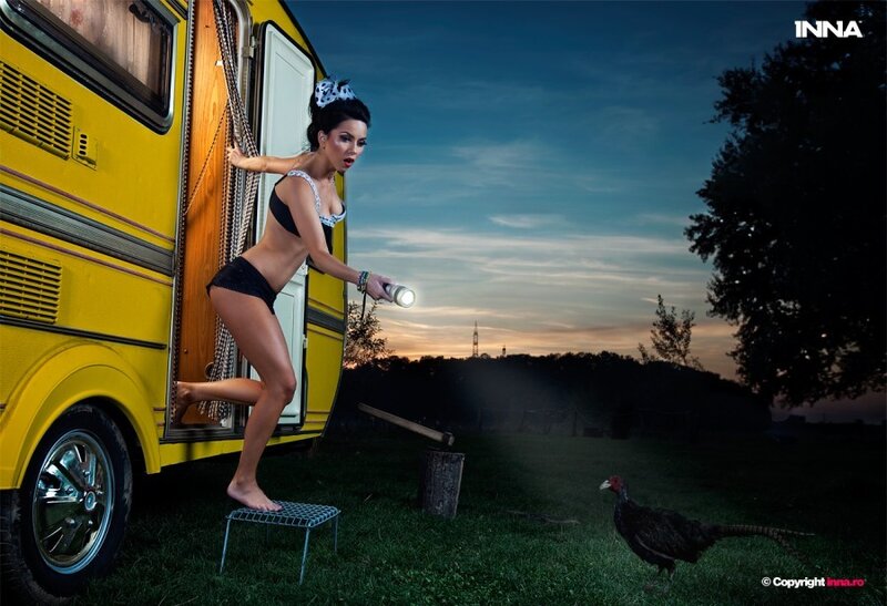 Woman exiting camper with flashlight