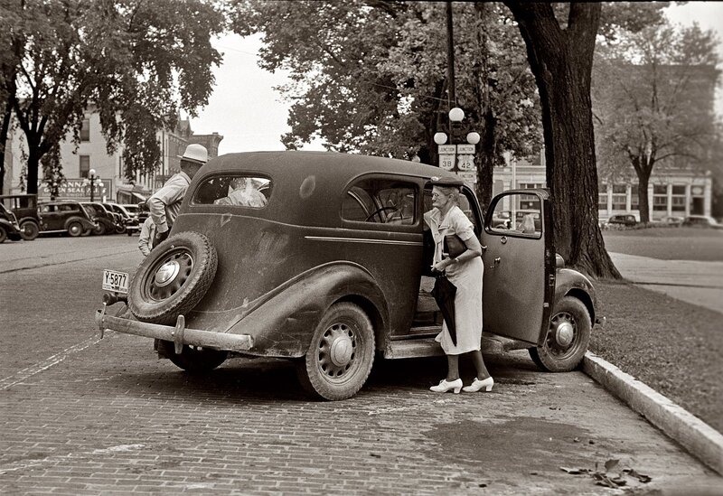 Woman Exiting Car — Black, Calm, Afternoon