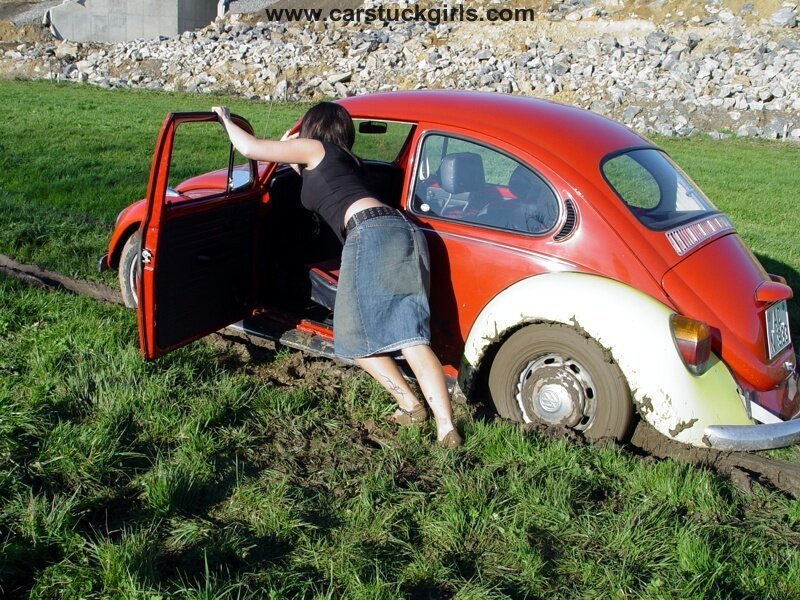 Woman Exiting Car — Red