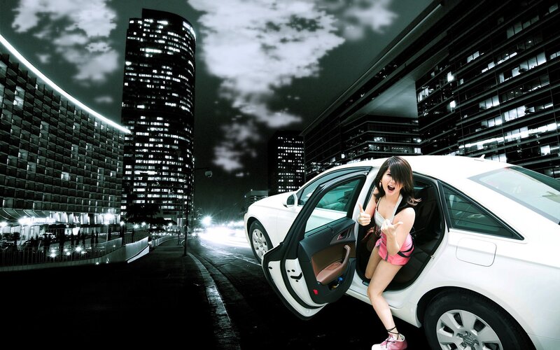 woman exiting white car at night