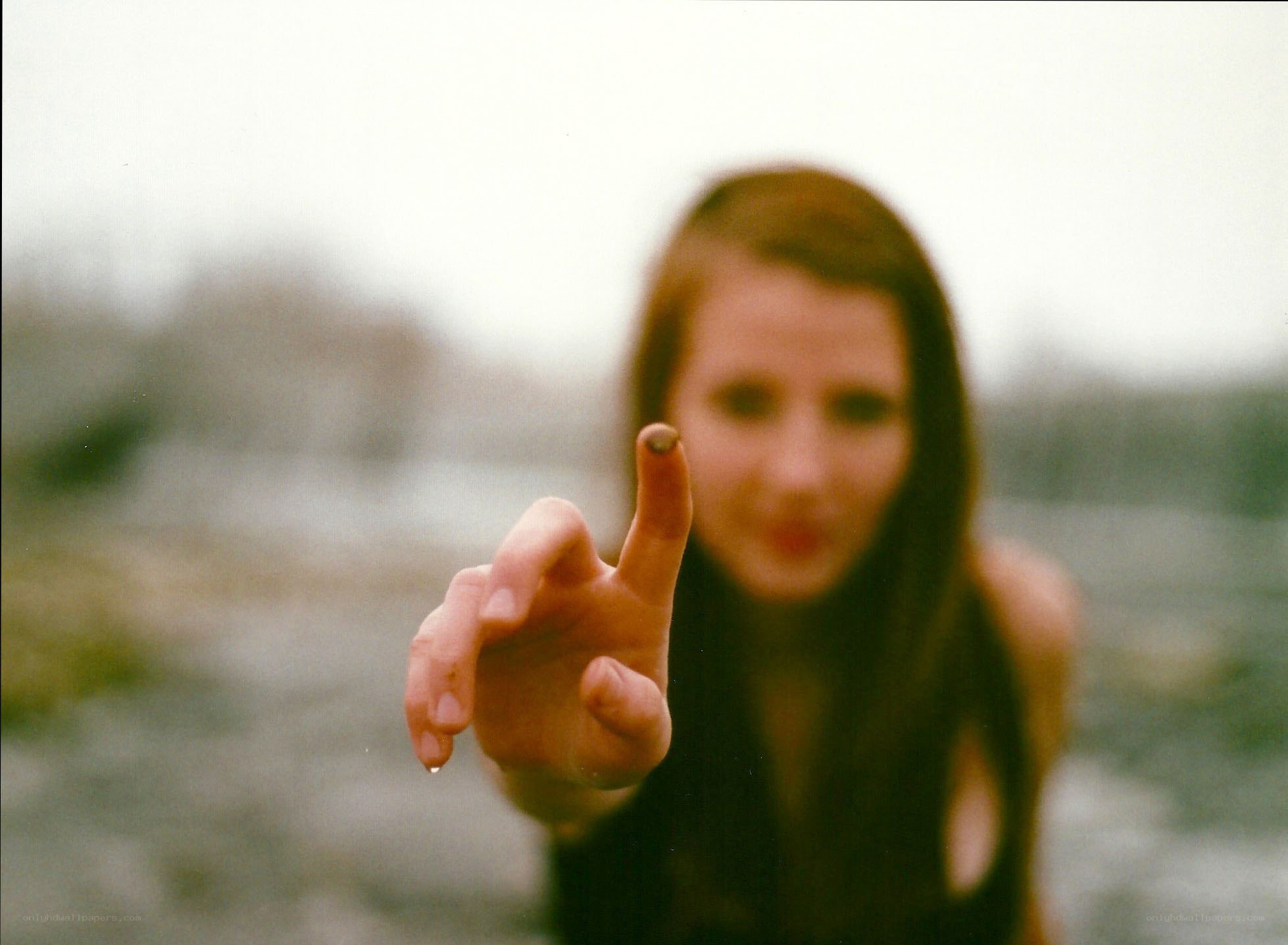 woman extending hand forward