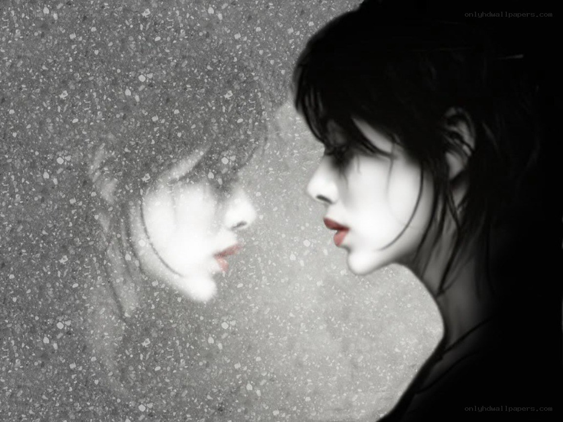 woman facing her reflection