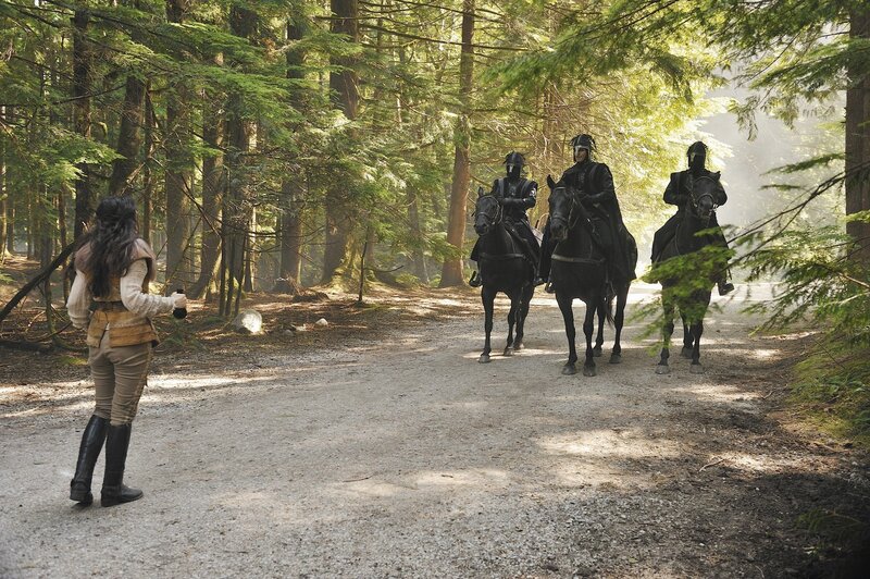 Woman Facing Knights on Horses