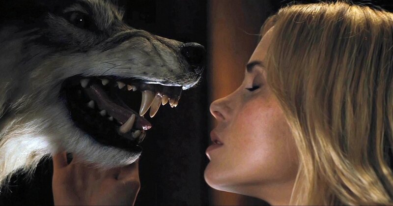 Woman Facing Wolf Head