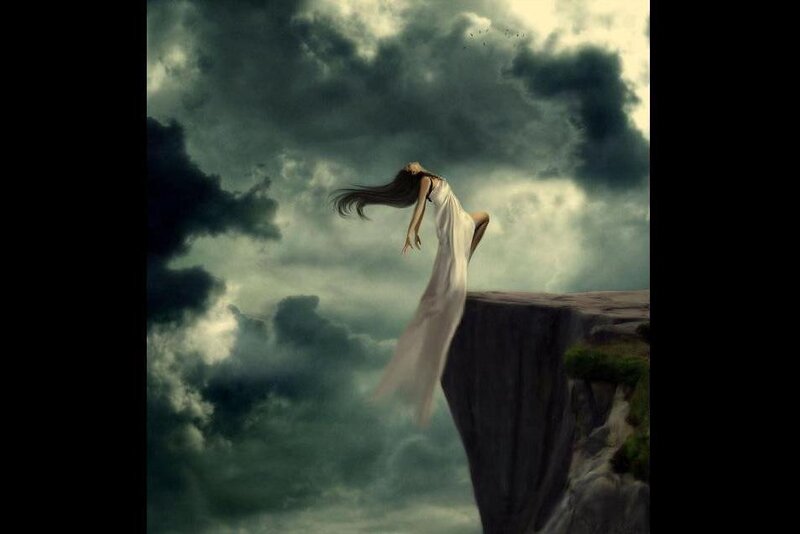 woman falling from cliff