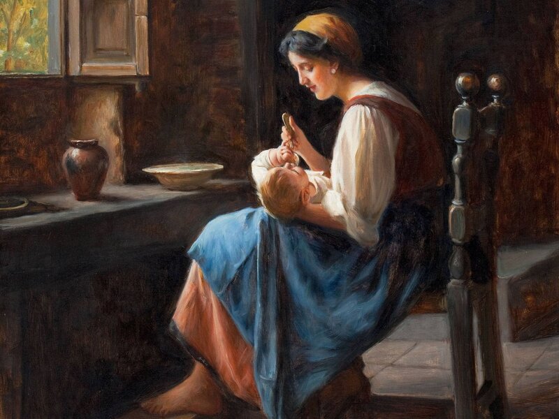 Woman Feeding Baby