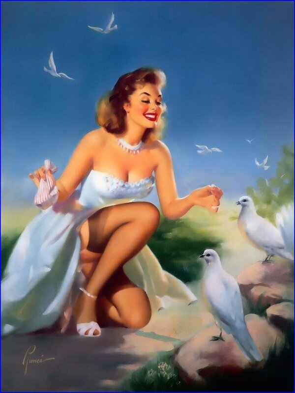 Woman feeding doves in garden