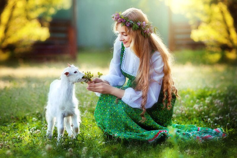 Woman Feeding Goat — Green, Serene