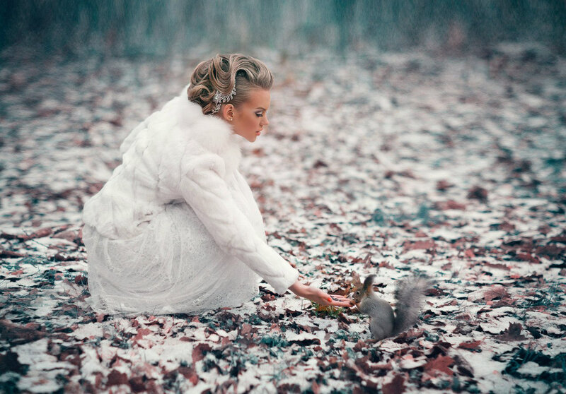 Woman Feeding Squirrel — White