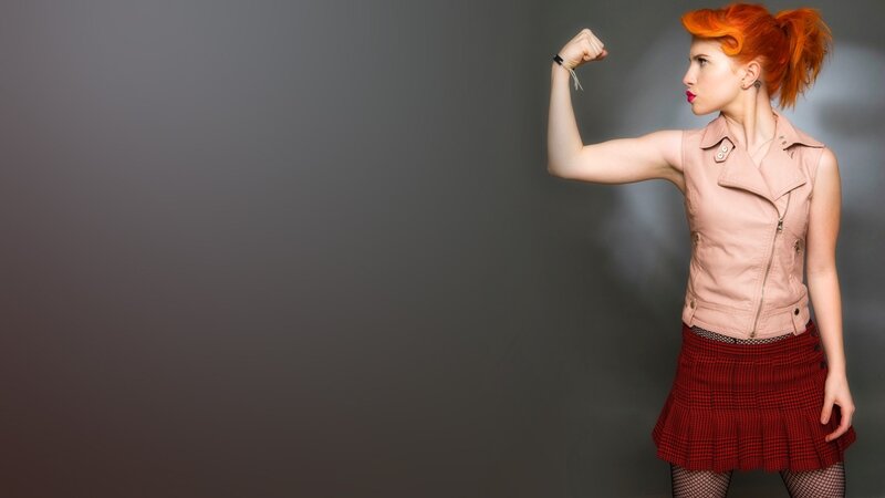woman flexing arm