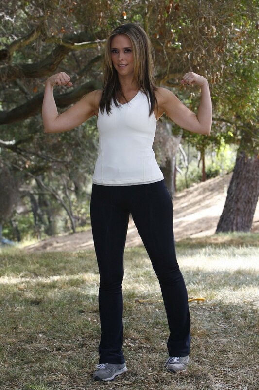 woman flexing in park