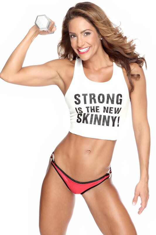 woman flexing with dumbbell