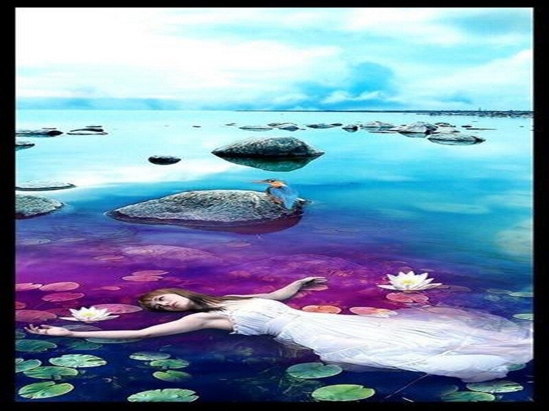 woman floating in a dreamlike lake
