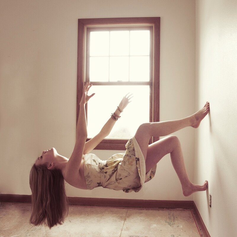 woman floating in a room