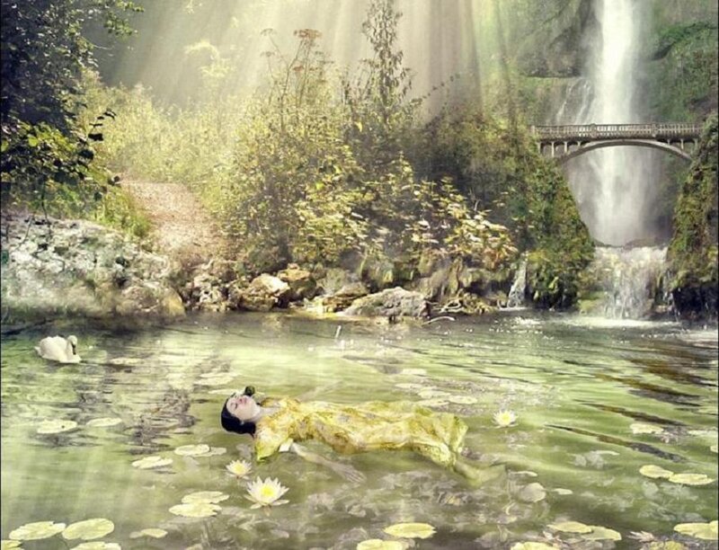 woman floating in a serene pond