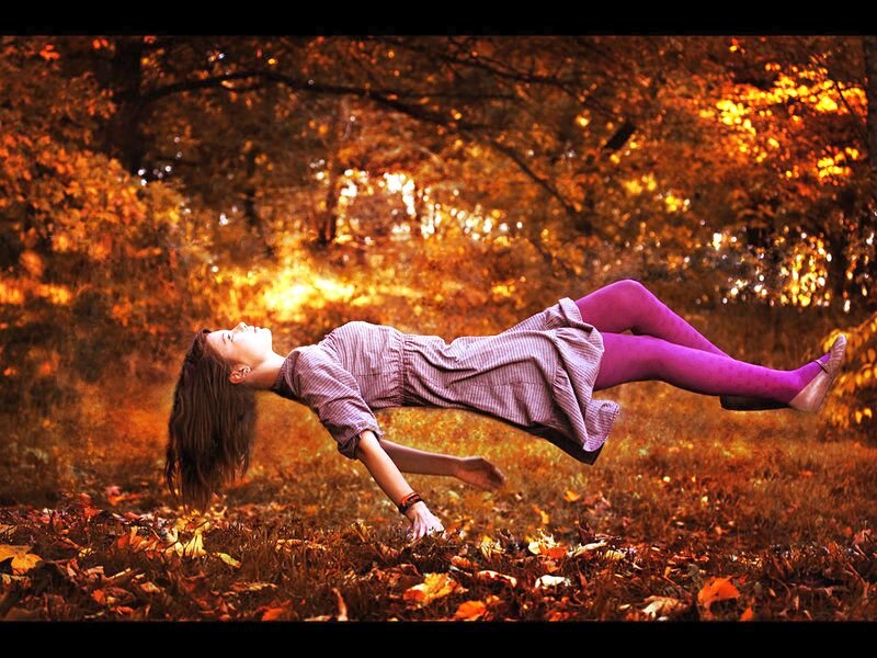 Woman Floating in Autumn