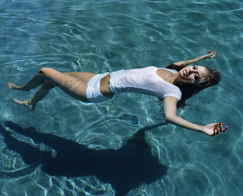 woman floating in clear water