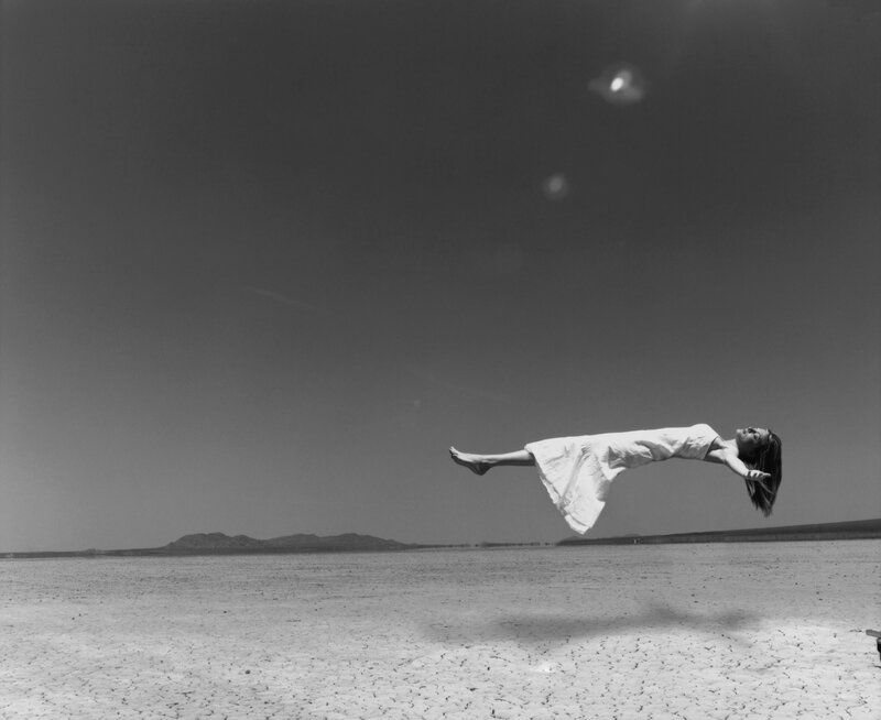 Woman Floating in Desert — Black