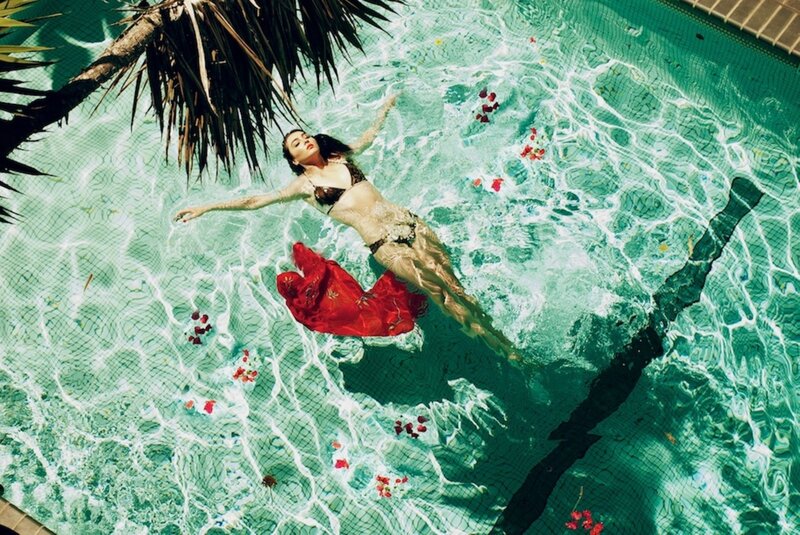 Woman Floating in Pool — Green