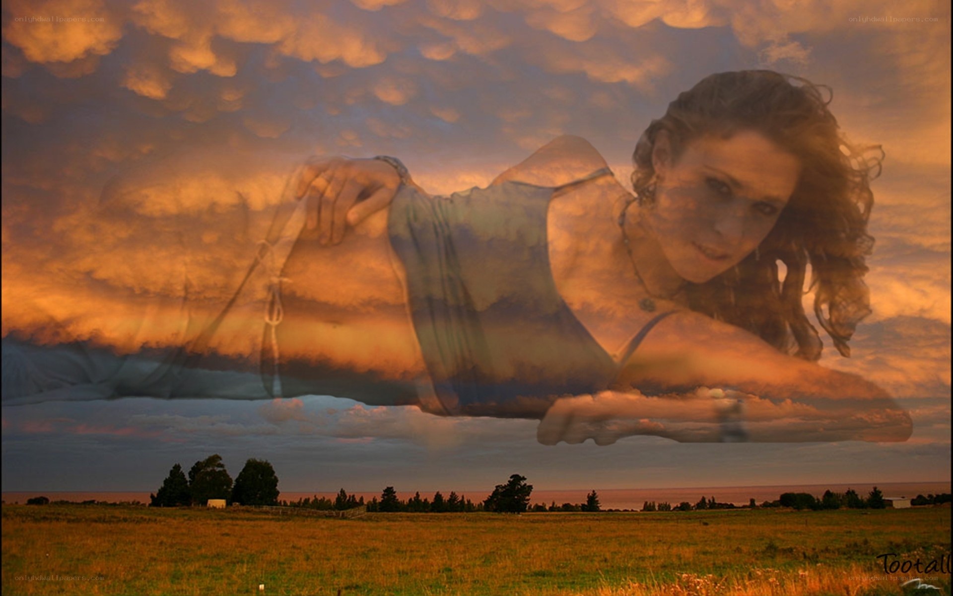 woman floating in sunset sky