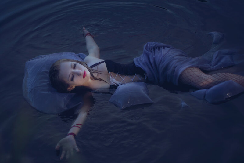Woman Floating in Water — Blue, Dramatic, Night, Photograph
