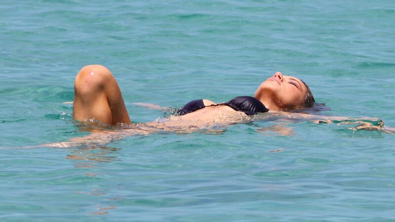 Woman Floating in Water — Blue, Relaxed