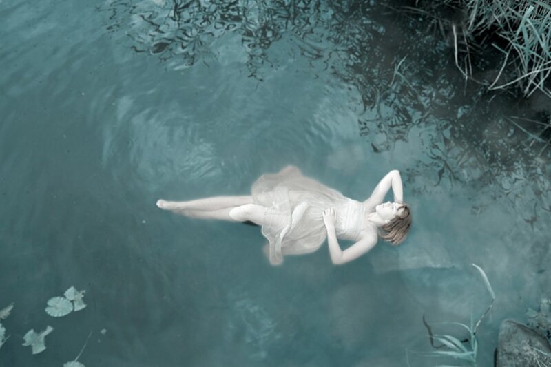 Woman Floating in Water — Blue, Serene, Photograph, Dress