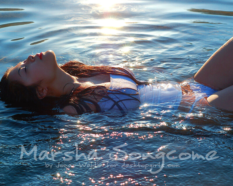 Woman Floating in Water — Blue, Serene, Sunset, Photograph