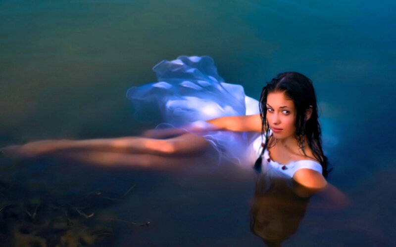Woman Floating in Water — Blue