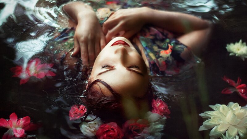 Woman Floating in Water — Red, Serene