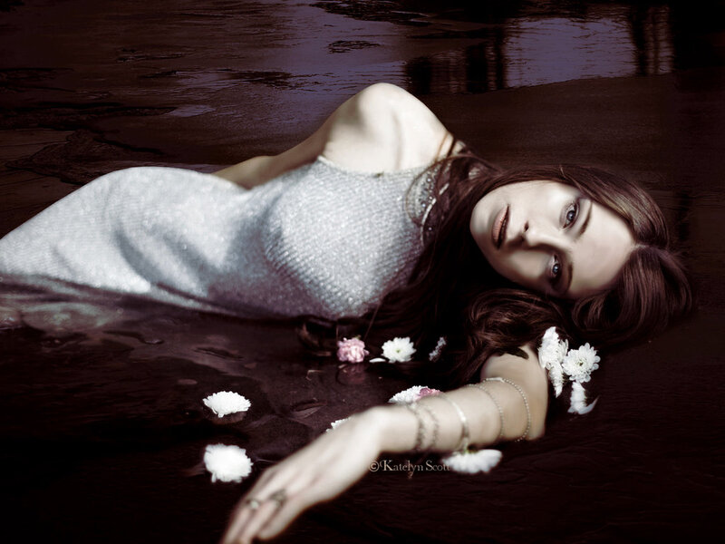 Woman Floating in Water — White, Dramatic, Photograph