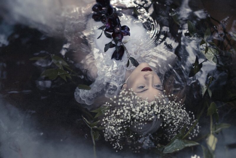 Woman Floating in Water — White, Dreamy, Photograph