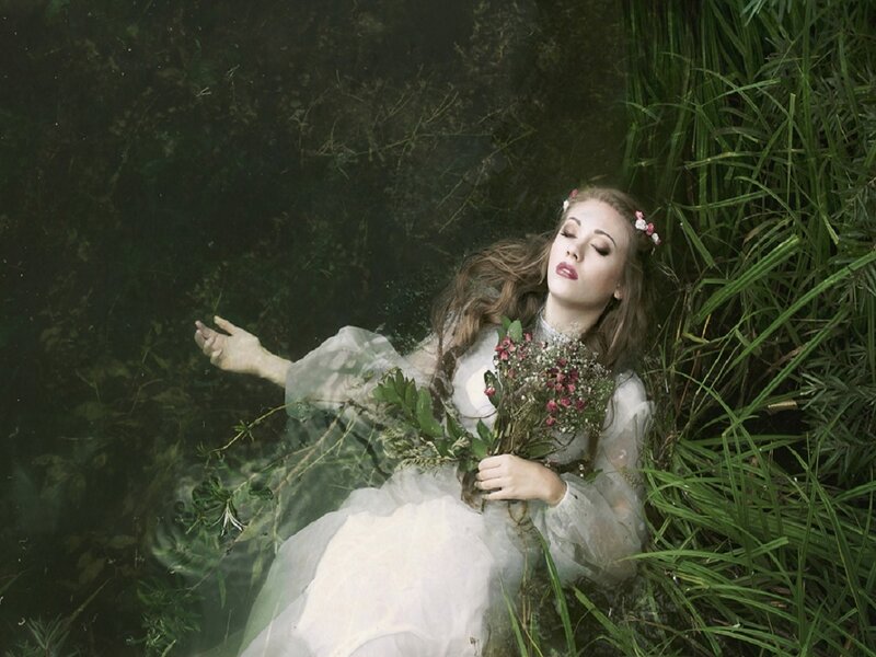 Woman Floating in Water — White, Serene, Photograph, Flowers