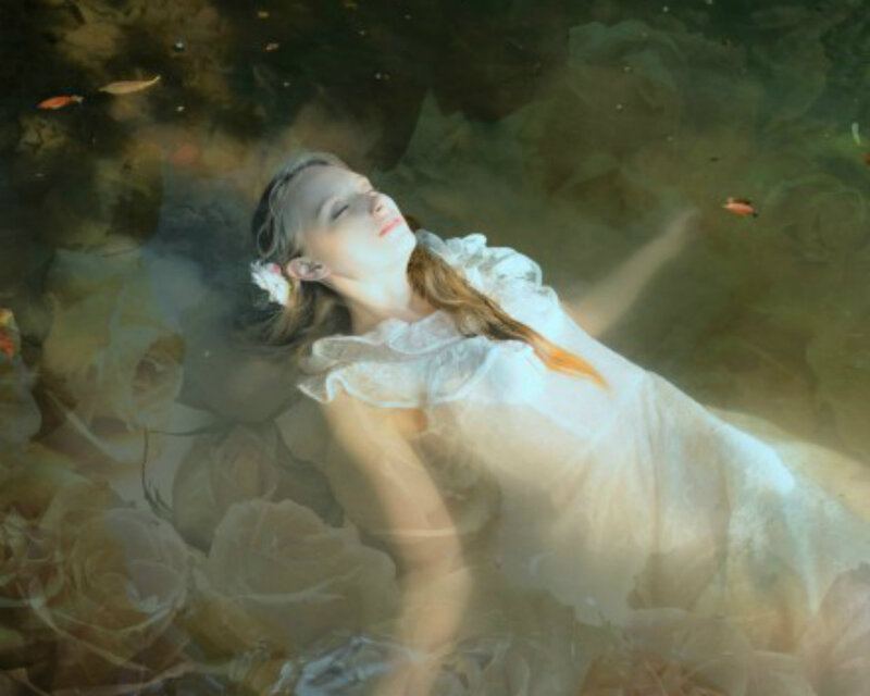 Woman Floating in Water — White, Serene