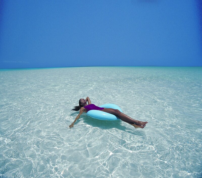 Woman Floating on Floatie