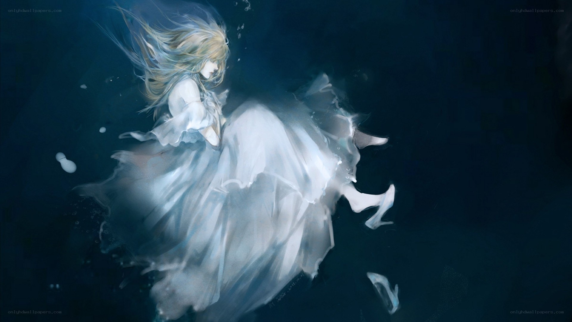 woman floating underwater