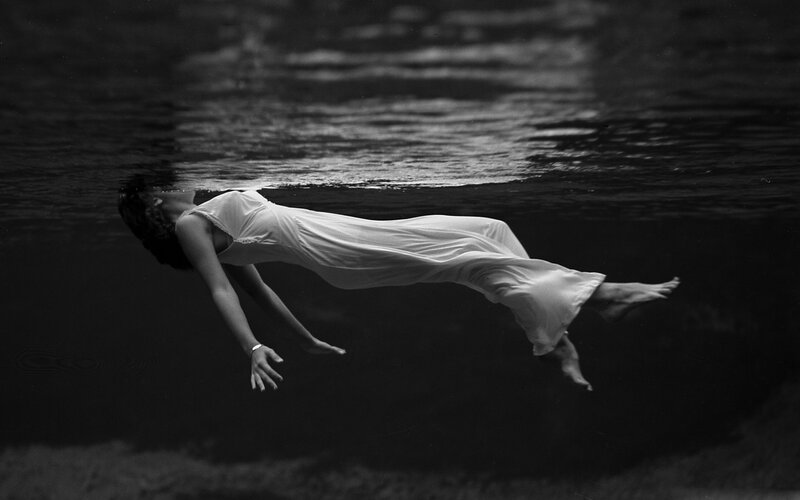 Woman Floating Underwater — Black