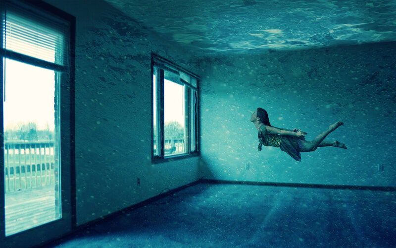 Woman Floating Underwater — Blue, Dreamlike