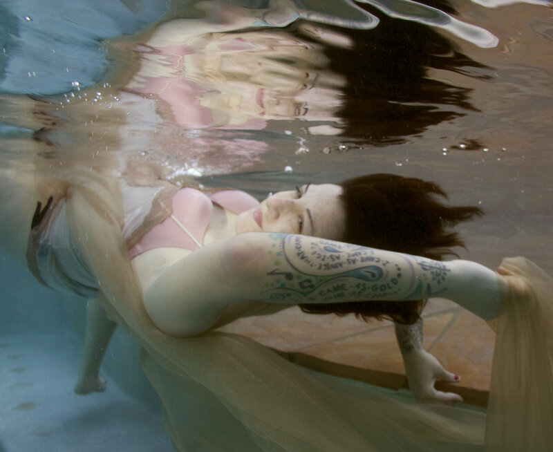 Woman Floating Underwater — Blue, Serene