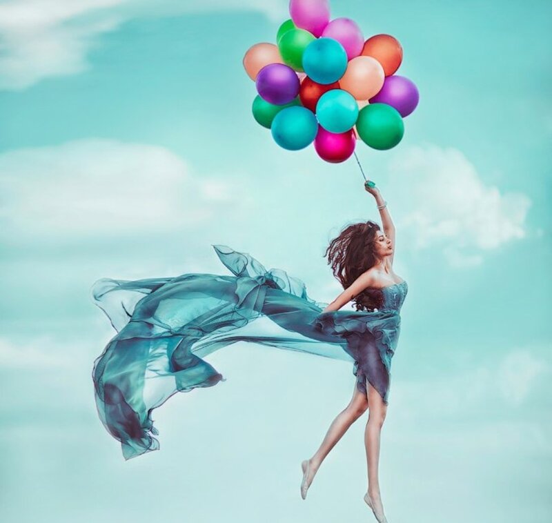 Woman Floating with Balloons — Blue