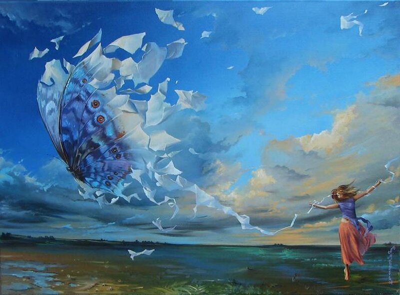 Woman flying a butterfly kite
