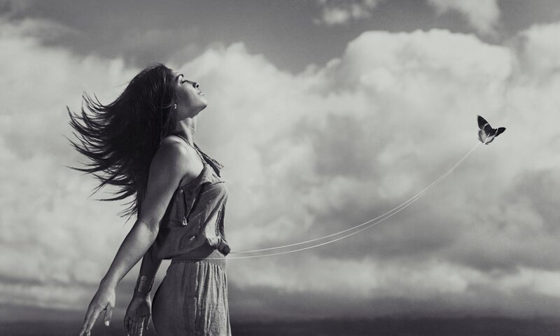 Woman Flying a Kite