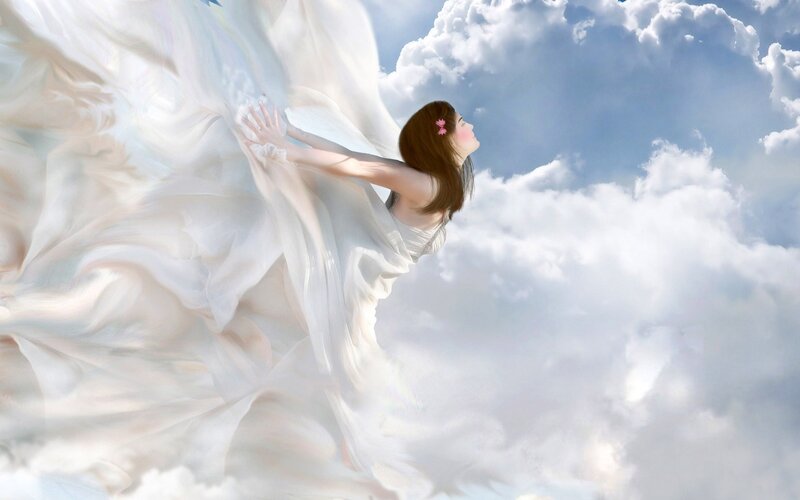 woman flying through clouds