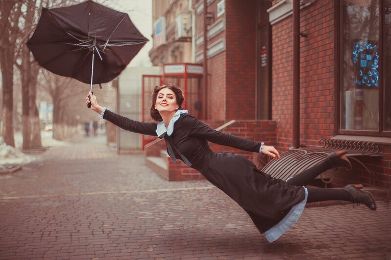 Woman Flying with Umbrella — Black