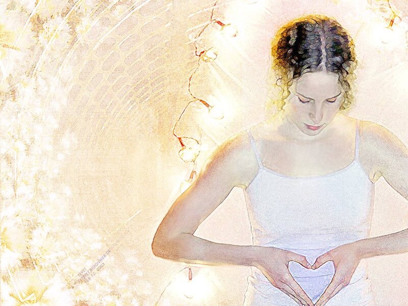 woman forming heart with hands