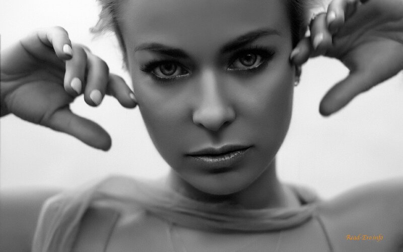 woman framing face with hands
