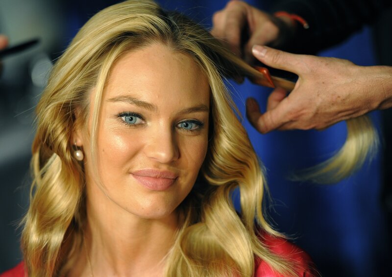 woman getting hair styled