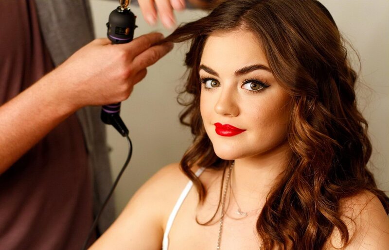 woman getting hair styled