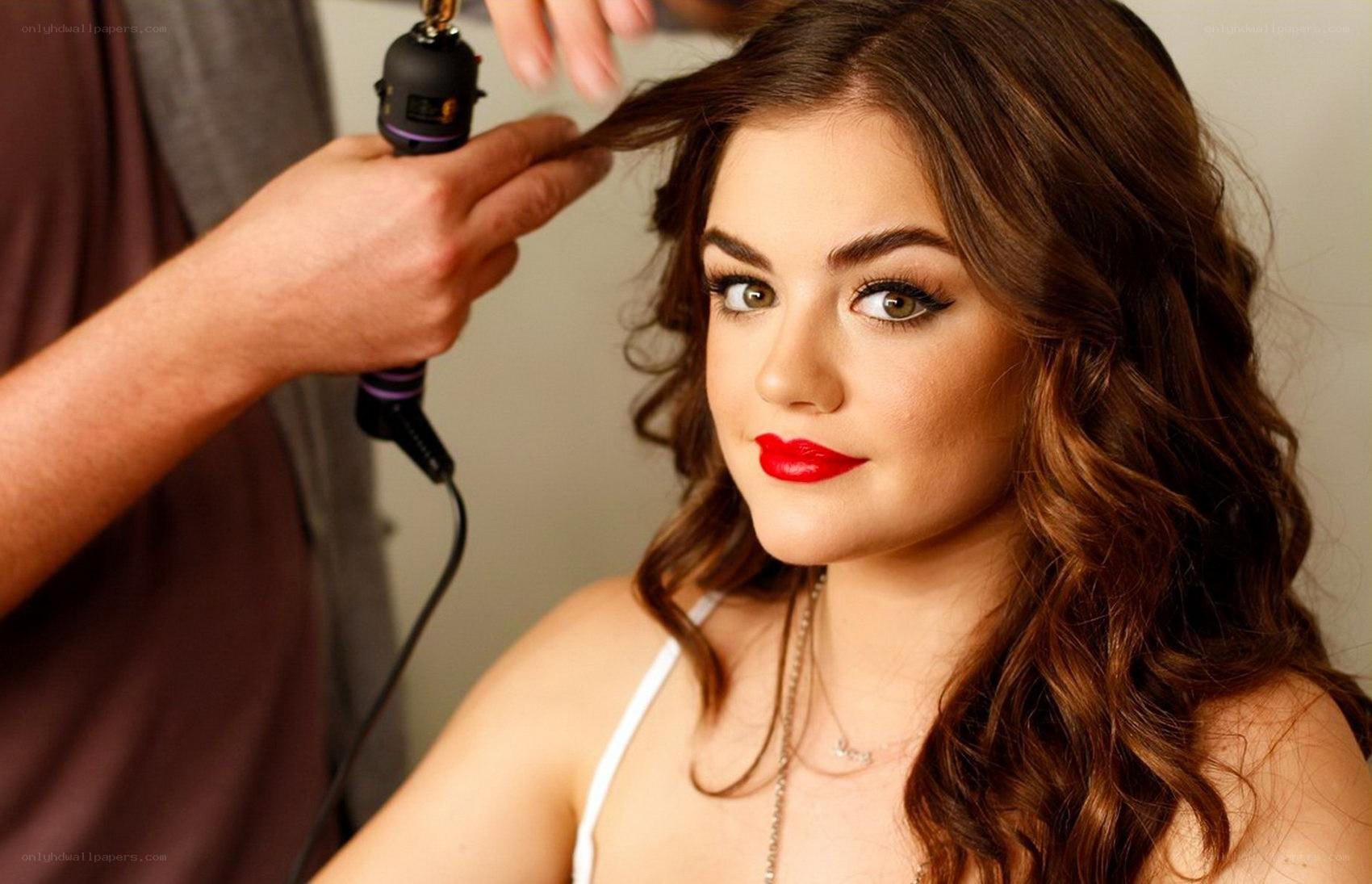 woman getting hair styled
